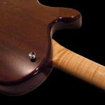 Back of body, chambered body. Carved bookmatched Flamed Maple top featuring original Basone f-hole.