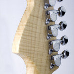 Mini electric guitar, strat shaped, flamed maple neck and headstock