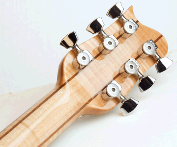 Phoenix handcrafted guitar, mahogany body, maple and ebony top, maple and mahogany neck, headstock detail picture. Photo by Robert Stefanowicz