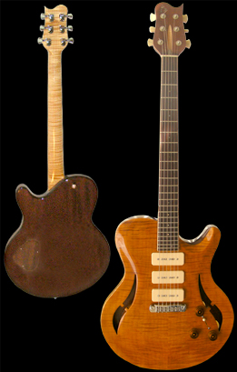 Carved single cut-away Chambered bookmatched Honduran Mahogany body. Flamed Maple top featuring custom f-hole. Trans Gold finish, Natural binding.